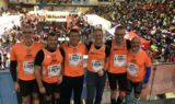 Sei aranciovestiti partecipanti alla Maratona di Reggio Emilia